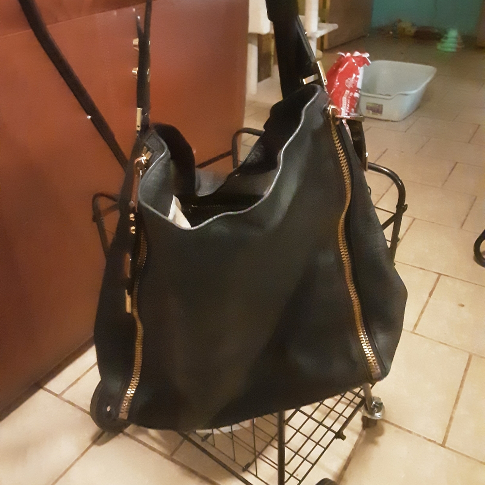 Michael Kors Black Hobo Bag with Sleek Design